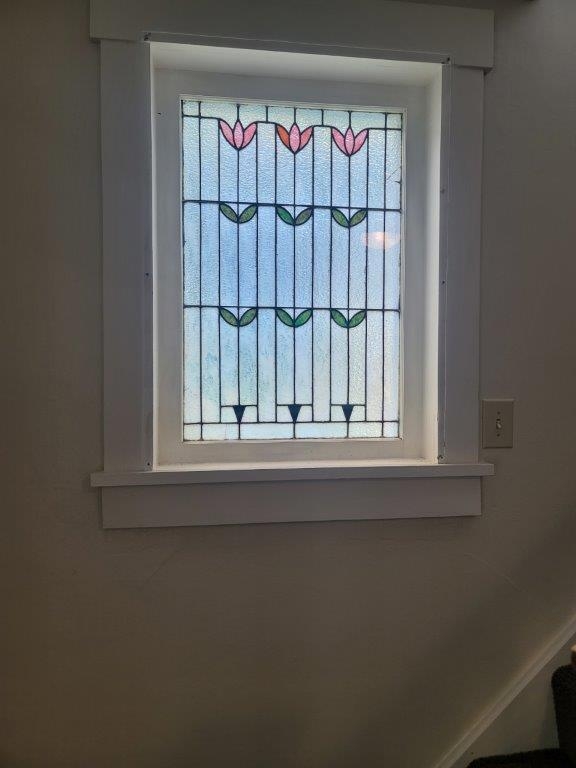 Stained glass at landing of staircase